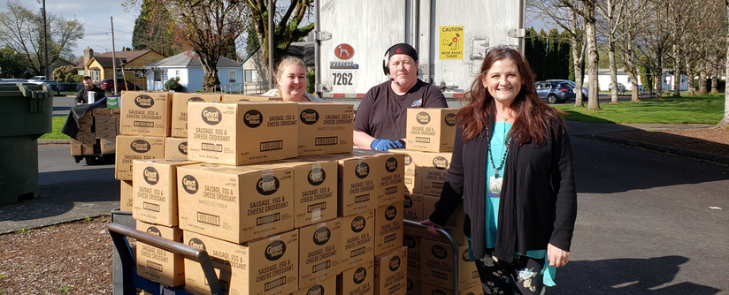 Truck Driver donates 52 cases of food for children