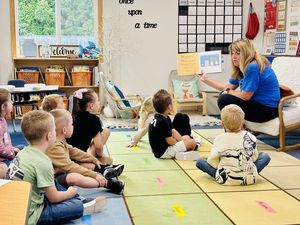 Denise Pearl, North Fork Principal, reading to students.