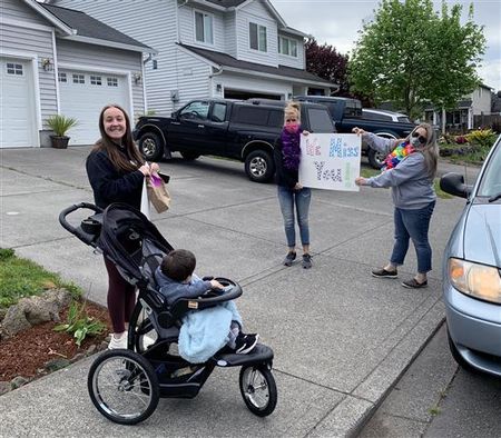 The PASS team is excited to see their students during deliveries... if only at an appropriate distance due to social distancing guidelines.
