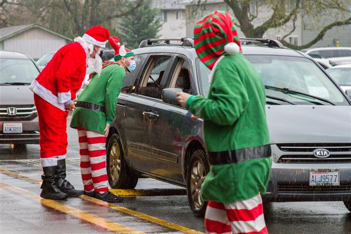 Teachers and staff from throughout the district volunteered to help Operation Santa become reality