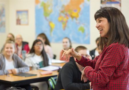 Kim Novak teaches American Sign Language (ASL) at Woodland High School (photo taken pre-pandemic)