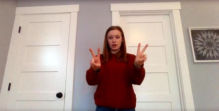 Jaylee Graham, a sophomore at Woodland High School, created a video to teach fourth-graders how to sign the school pledge
