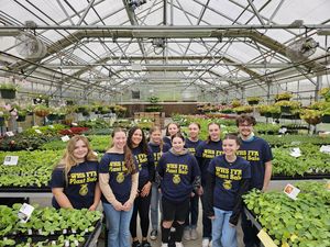 Picture of students in a greenhouse