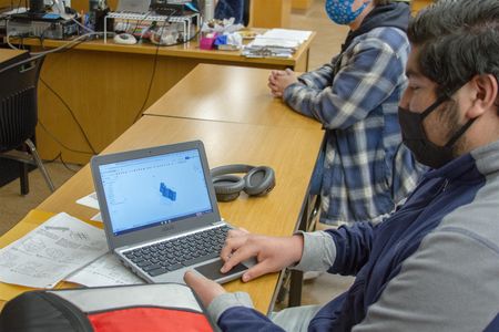 Oliver Rosas (senior) shows a Technical Drawing project he designed using Computer-Aided Drafting (CAD) software