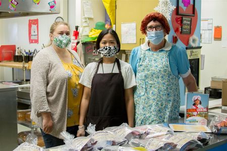 From left: Laura Perry, Anna Moran, and Cristina Forgey cook up ideas for events and contests to inspire students to explore the world of cooking