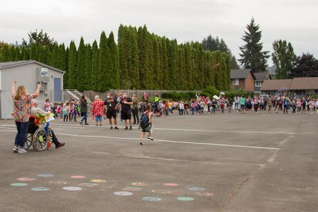 Students and staff at North Fork Elementary celebrate Head Custodian Ed Sorensen’s retirement with a Celebration Tunnel