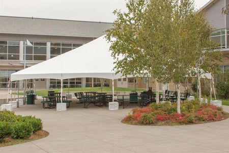 In order to ensure the health and safety of attending students, the district set up 40' x 40' outdoor tents