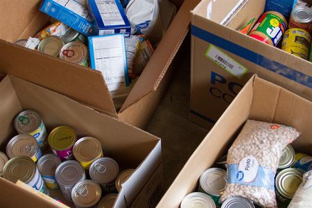 The district-wide food drive raised nearly 3,000 pounds of canned and dried food
