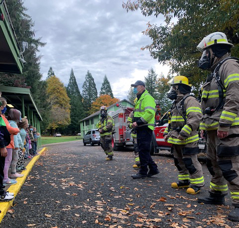 Fire Chief Gary Stuart and the Cowlitz-Skamania Fire District 7 teach fire safety to Yale students each year