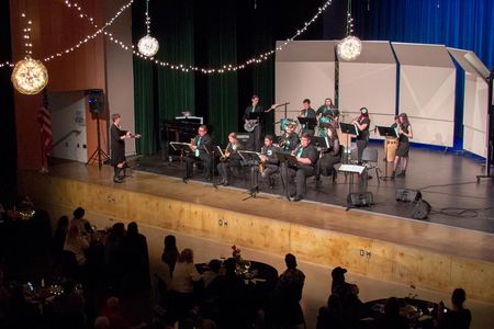 Bryana Steck, WHS Band Teacher, conducts the Jazz Band in their performance at Taste of Jazz