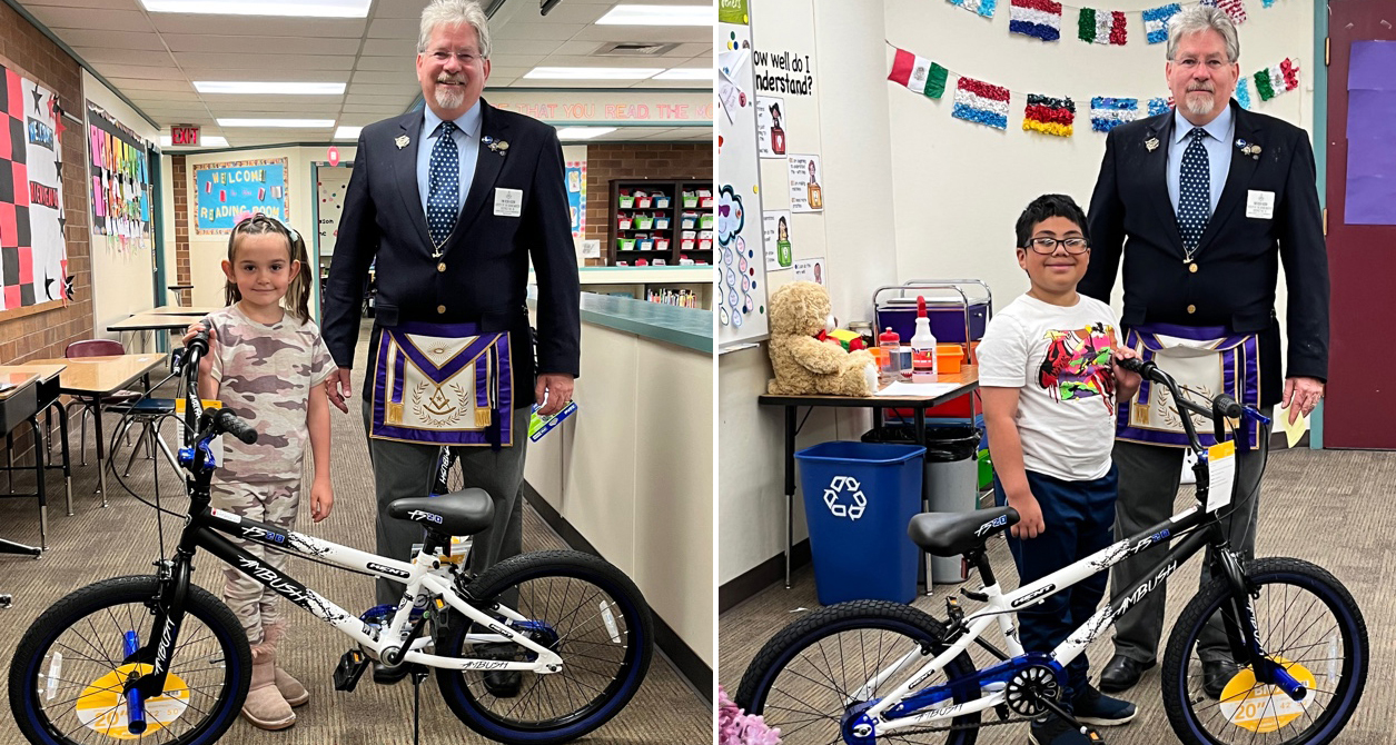 Ron Horn, Master of the Woodland-Kalama Masonic Lodge #17, presented bikes to Woodland elementary students who won the raffle