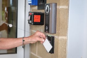Image: Using a security badge to access a school building