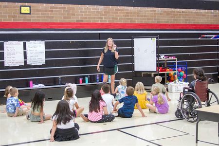 Cheryl Nesbitt, a physical education teacher at Columbia Elementary School, uses adaptive curriculum so all of her students can participate in P.E.