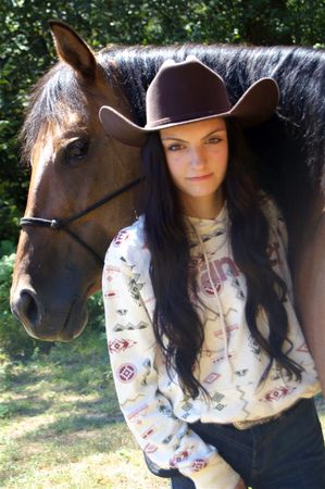 Hope Batchelder, a TEAM High School student, volunteers at Healing Steps to help kids with disabilities ride horses