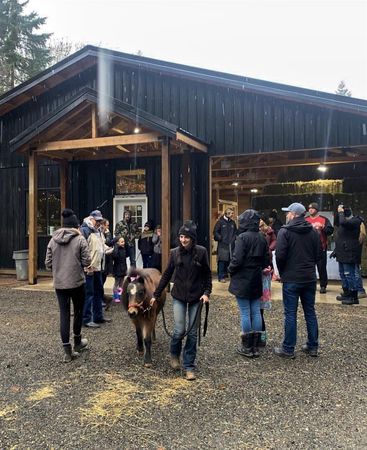 Hope Batchelder continues to volunteer at Healing Steps where she leads rides and helps cares for horses