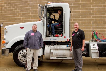 Tribeca Transport, a local trucking company, brought a semi truck to talk to students about careers in cargo transport