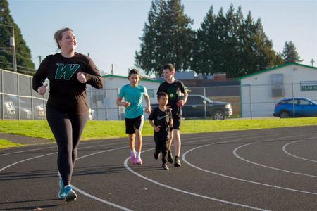 Clarissa Rinehart (left) started the Running Club to offer students a way to stay healthy and active after school