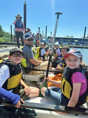 Students explored in the Columbia River in canoes fashioned to look like ones Native American tribes might use