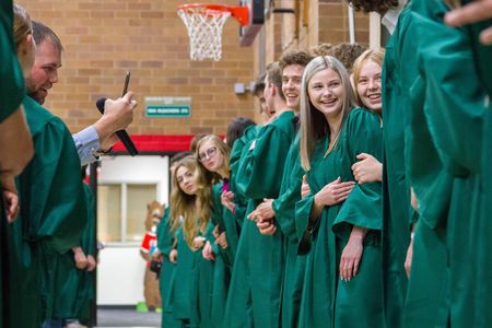 Woodland High School's graduates paraded through the district's schools to inspire younger students to reach graduation