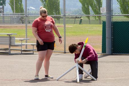 Jennifer Benedict's network of contacts at the Air Force Academy and NASA help her develop thrilling experiments for her students