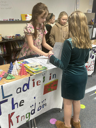 During the Medieval Fair’s student store, students sold homemade arts and crafts for currency earned during their lessons