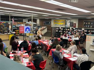 Teachers doing table work on math