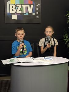 Newscasters in Biz Town