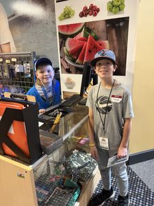 2 students at a store in Biz town