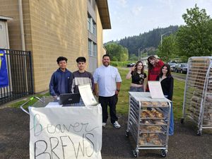 Culinary students greeted buyers with coffee and sweet treats