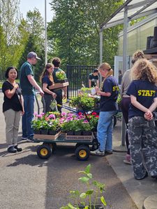 Students loading plants